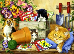 Рыжая кошка с котятами